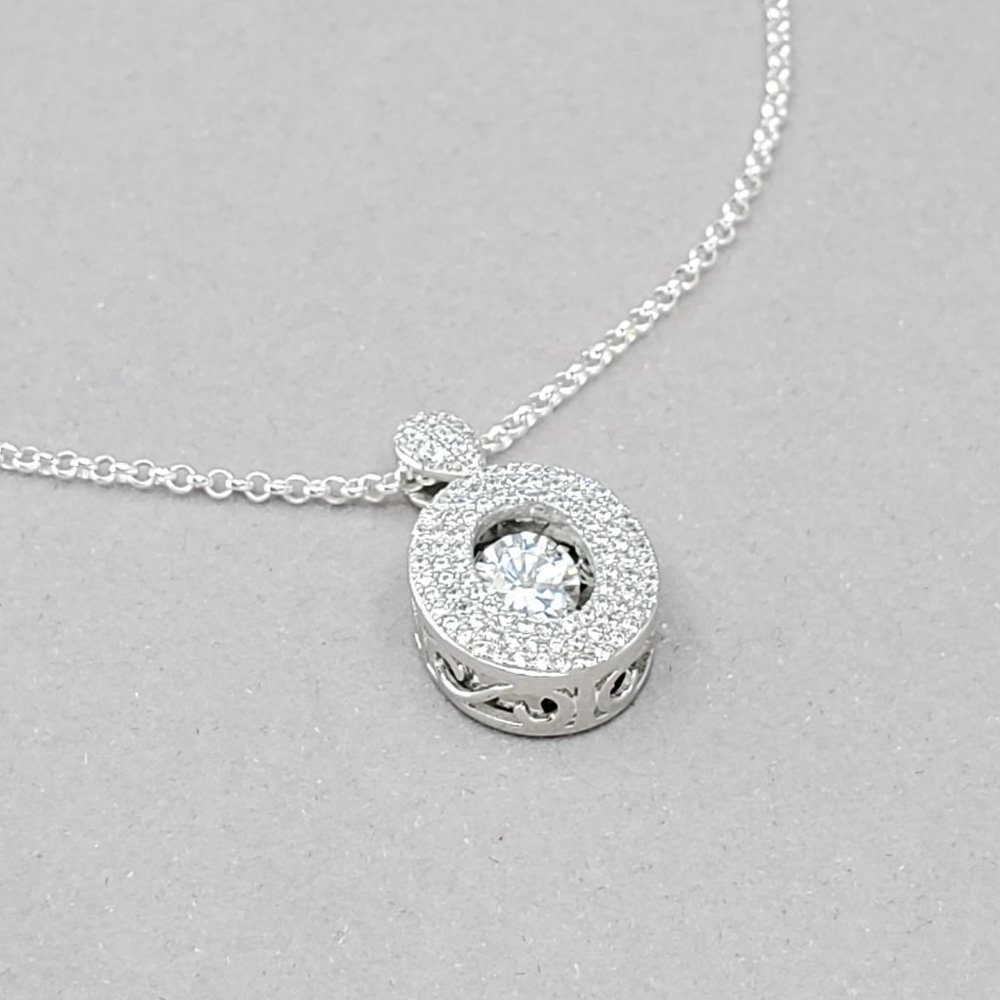 Sterling Silver Necklace  Dancing Pendant w/ CZ